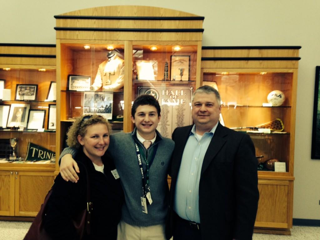 Trinity junior Sam Stockton posed with his parents following the surprise announcement by head coach Dale Helfrich that Stockton was named the Gatorade Player of the Year for Soccer in Kentucky.