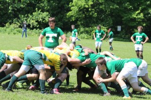 The Rocks and Tigers fought it out during the state championship rugby match, won by St. Xavier 31-0. photo by Forde Womack